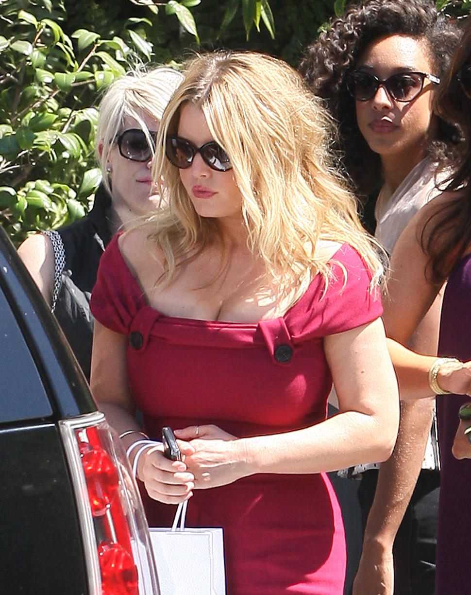 Jessica Simpson, red dress, leaves 'The Terrace Room' restaurant, Beverly Hills, August 25, 2010.