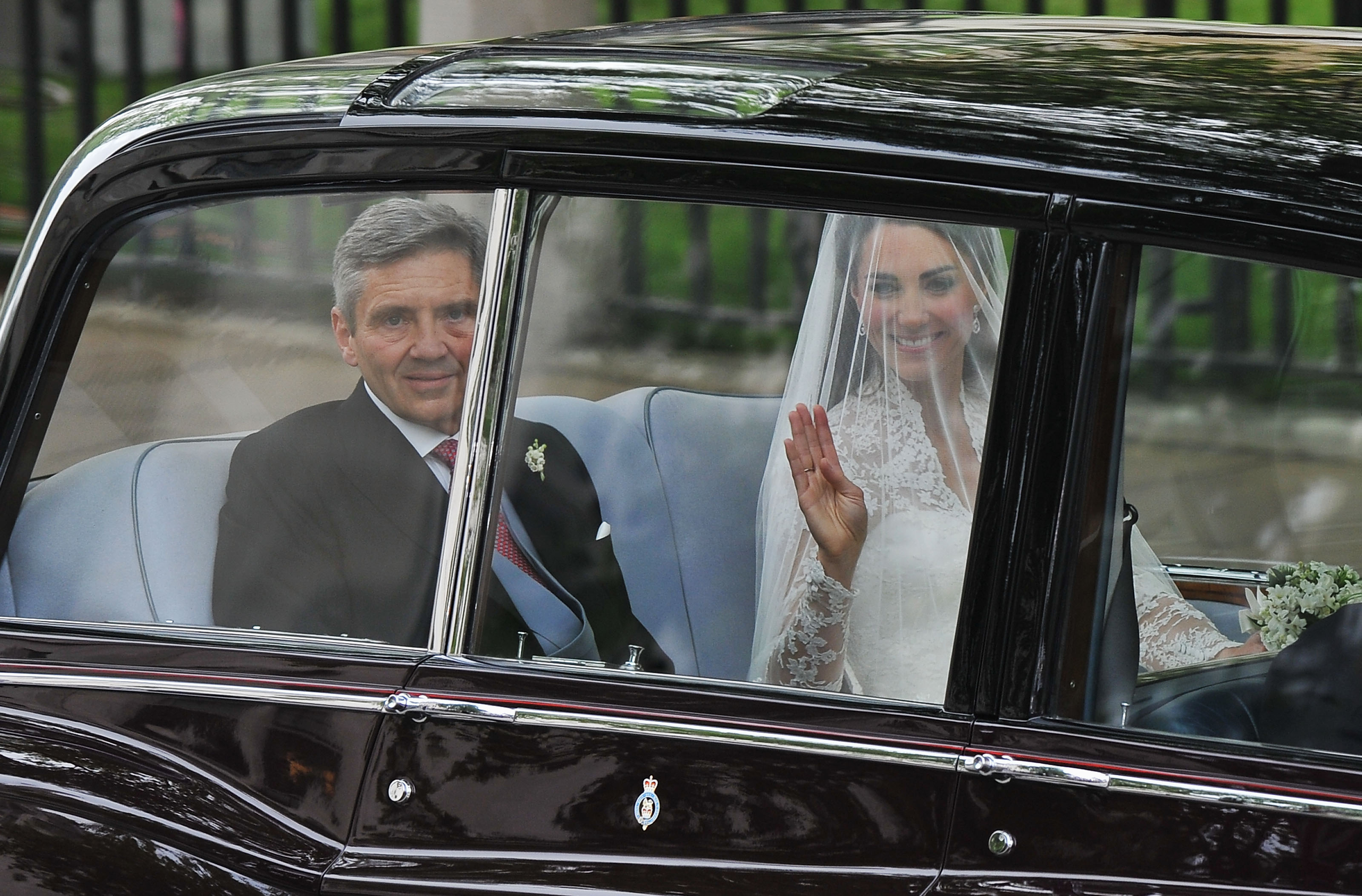 Catherine Middleton, Duchess of Cambridge, with her father Michael Middleton, smiles as she arrives at Westminster Abbey for the Royal Wedding, Central London, April 29, 2011.