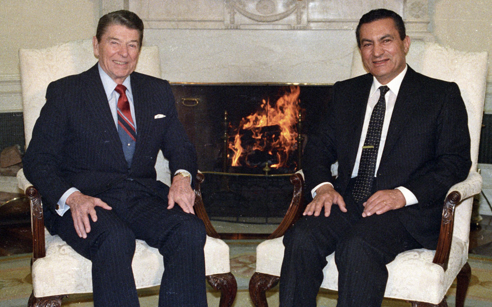 U.S. President Ronald Reagan and Egyptian President Hosni Mubarak in the White House Oval Office, Washington, D.C., January 28, 1988.