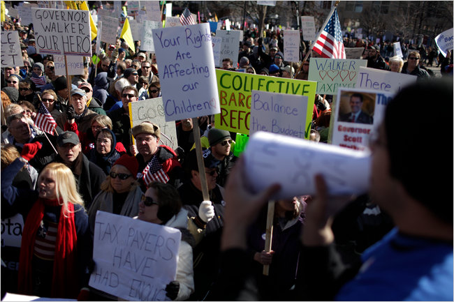 In opposition to the opposition which overran the capital city for much of the week by union supporters, state employees and students; a counterdemonstration, self-described Tea Party, members and other fiscal conservatives show their support for the Governor Scott Walker’s plan to cut collective bargaining rights and benefits for public workers, Madison, Wisconsin, February 19, 2011.
