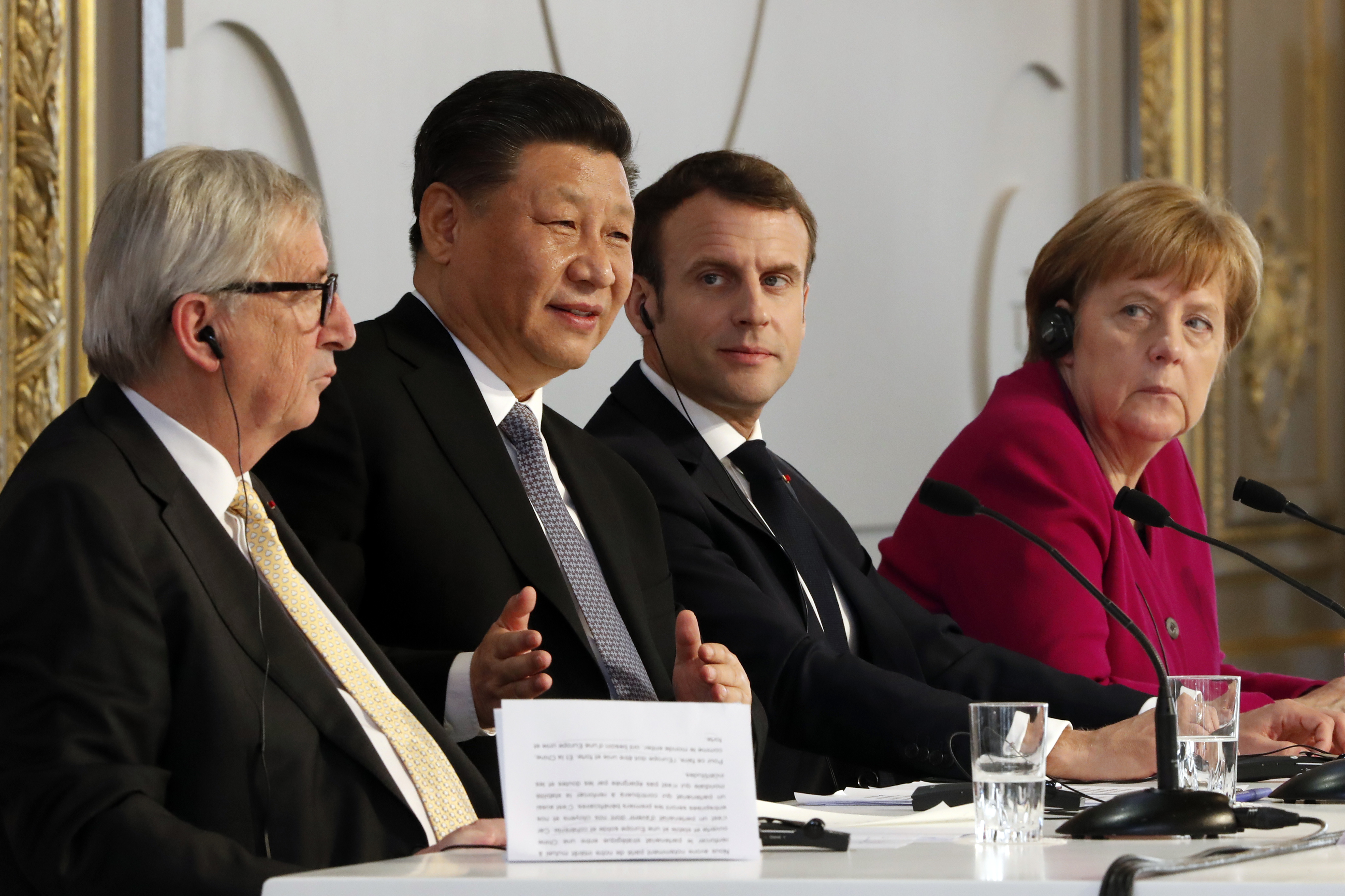 European Commission President Jean-Claude Juncker, Chinese President Xi Jinping, French President Emmanuel Macron and German Chancellor Angela Merkel hold a press conference at the Elysee presidential palace, Paris, March 26, 2019.